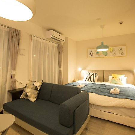 Апартаменты Sky Living Namba Осака Номер фото