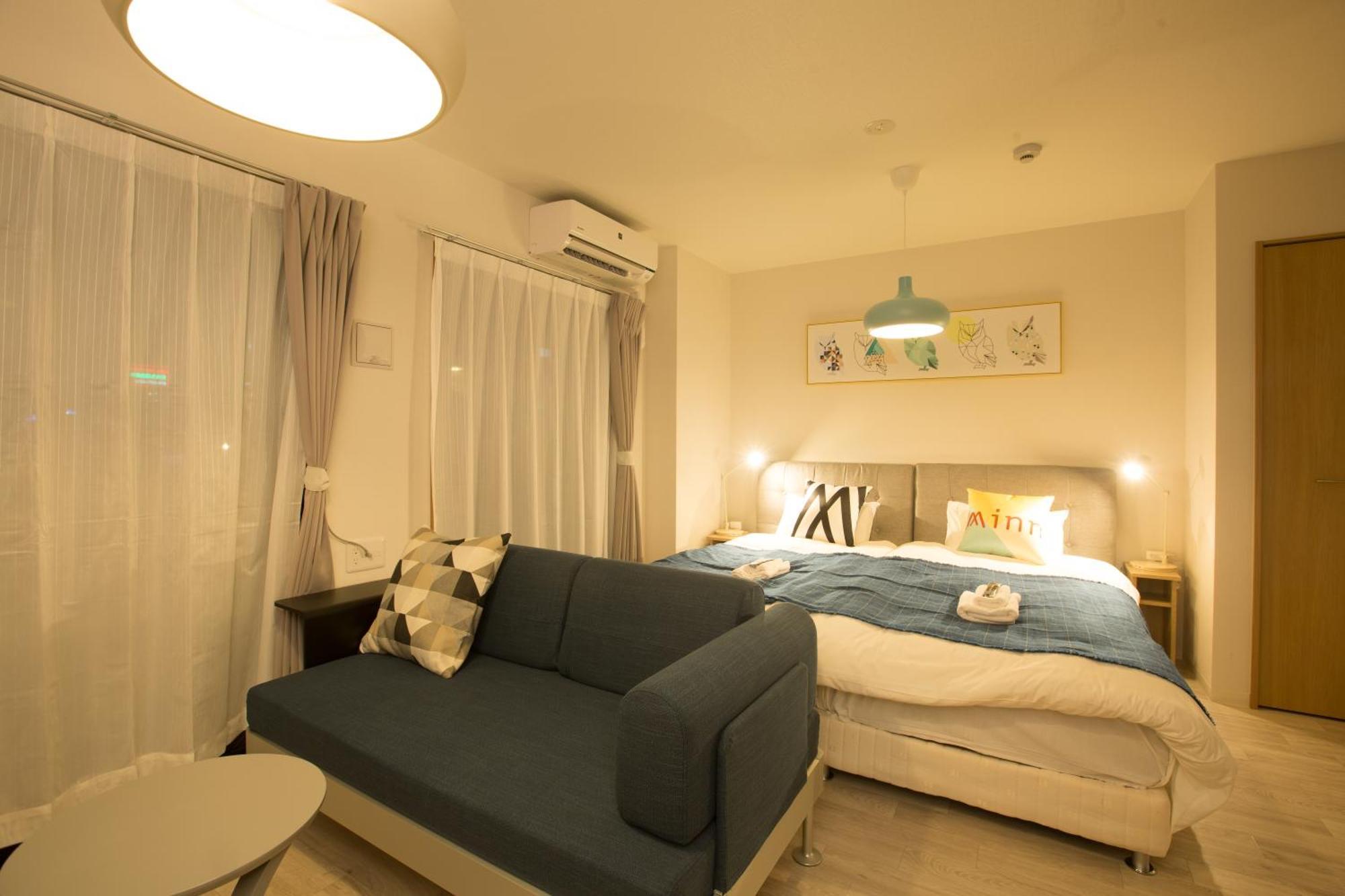 Апартаменты Sky Living Namba Осака Номер фото