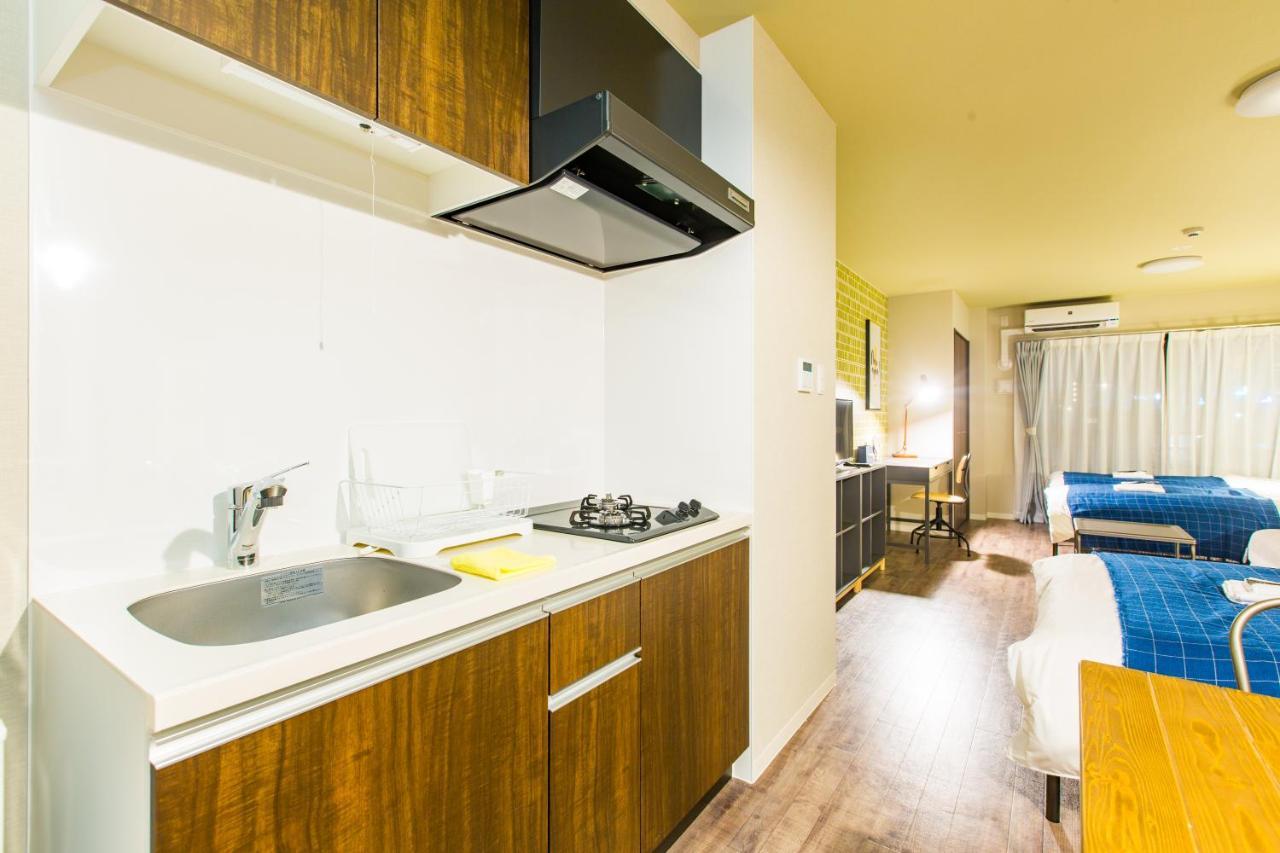 Апартаменты Sky Living Namba Осака Экстерьер фото